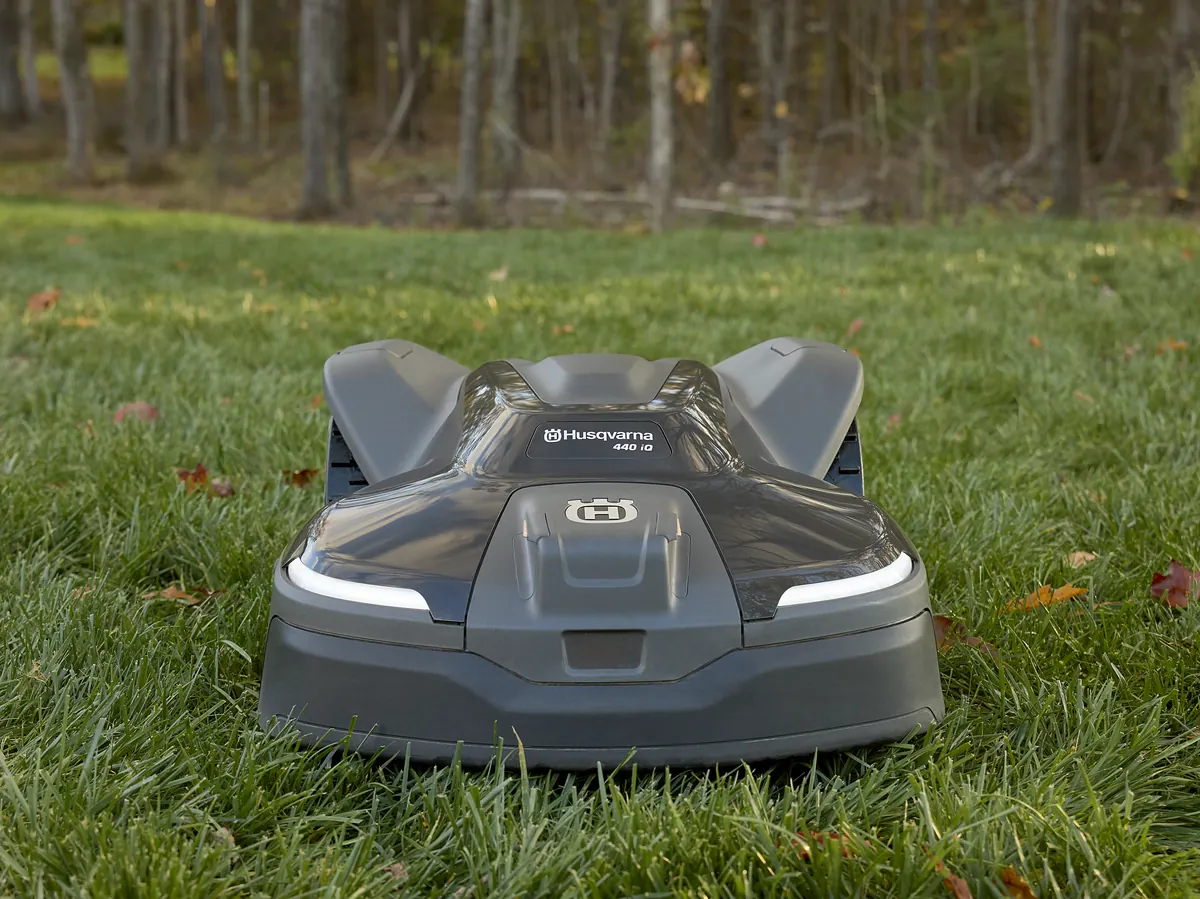 Front view of a Husqvarna Automower iQ Series robotic mower